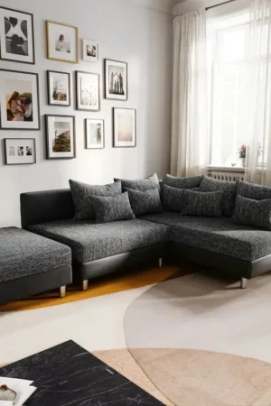 Offre Exclusive Canapé-d'angleClovis noir avec tabouret ottoman droite modulaire