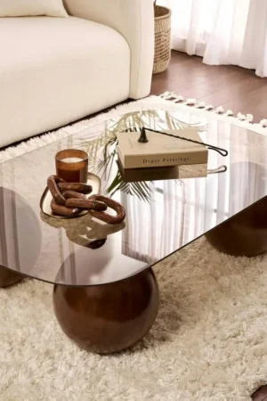 Meilleure Vente Table basse verre ambré bords arrondis 4 pieds boule KOCHI